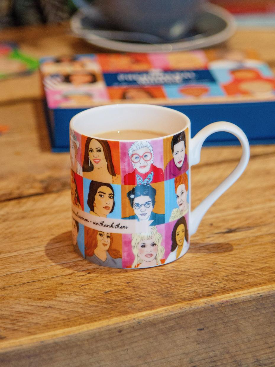 Phenomenal Women Mug by Talking Tables. This beautifully illustrated china mug features portraits of various inspirational women including Frida Kahlo, Oprah Winfrey, Ruth Bader Ginsburg, Amelia Earhart and Malala Yousafzai.